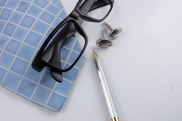 close-up of eyeglasses and fabric of table