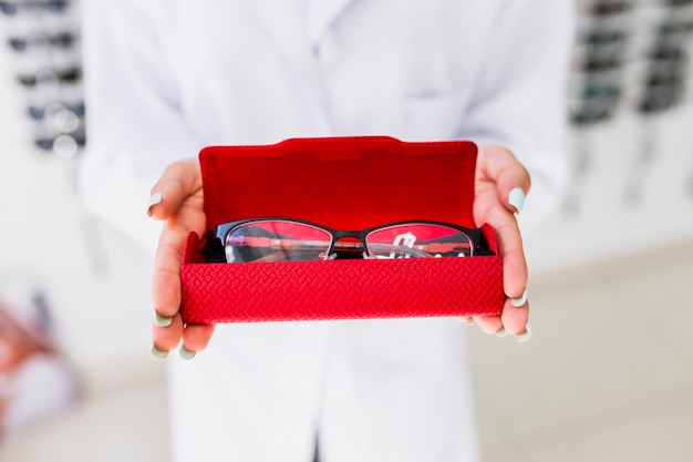 Close-up of eyeglasses in red case