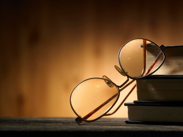 Photo close-up of eyeglasses on table