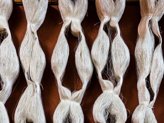 Photo close-up of fabric hanging by wall