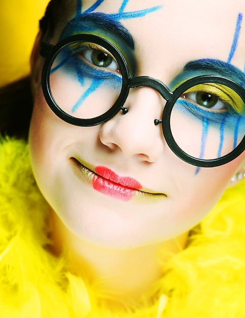 Close up of a face of a girl with creative visage