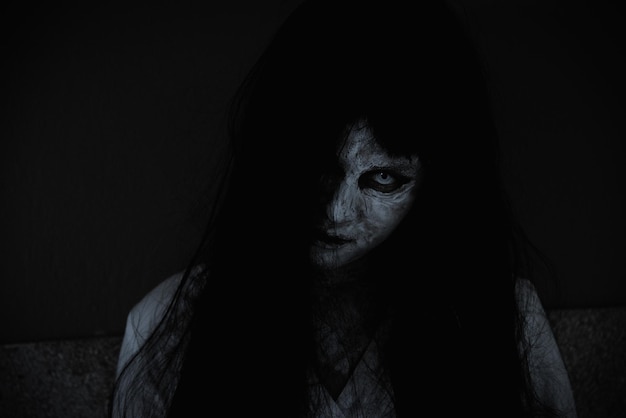 Close up face of horror woman ghost cruel