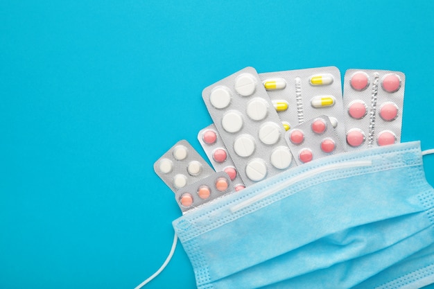 Close up face mask with a bunch of tablets