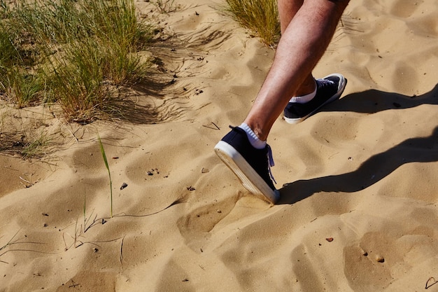 Close up fashion image of man walking alone