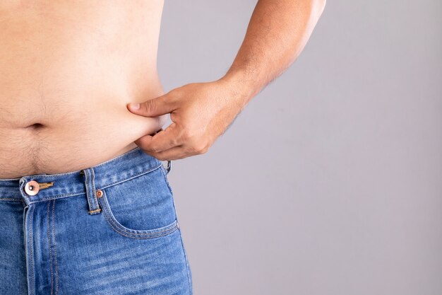 Fat Man Trying Put On Pants Stock Photo 631901717