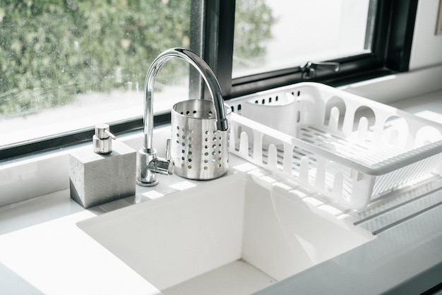 Photo close-up of faucet in bathroom