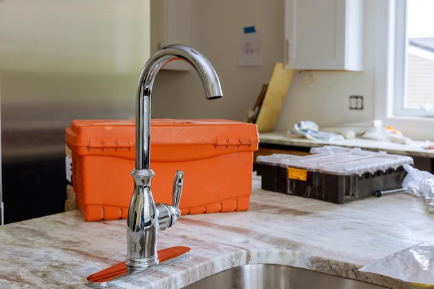 Photo close-up of faucet on table at home