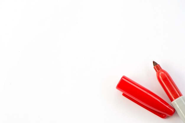 Photo close-up of felt tip pen over white background