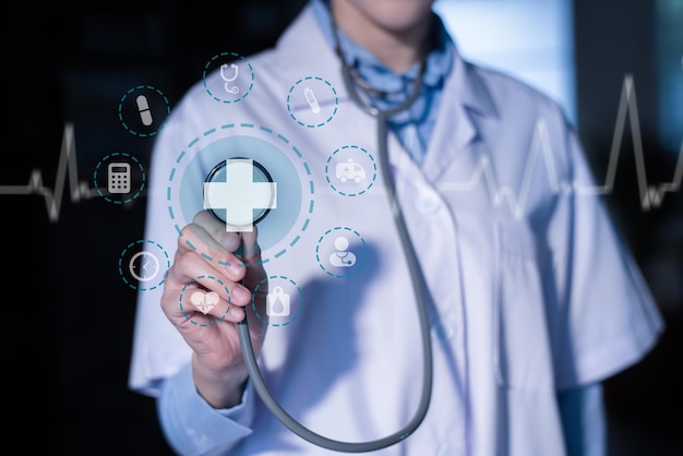 close-up of female doctor hand stethoscope head ready to examin patient. healthcare and medical concept.