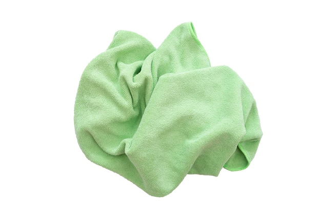 Close up of female green cloth to wipe creased fabric characteristics White isolated background