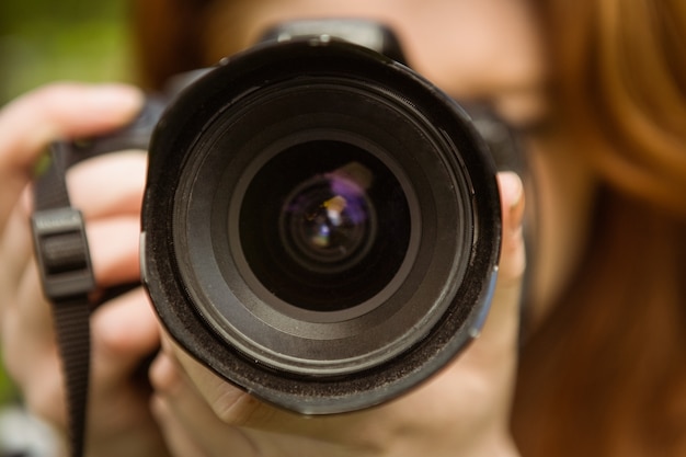 Close up of female photographer