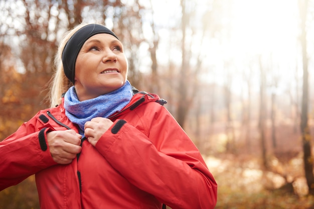 Close up of female senior runner outdoors