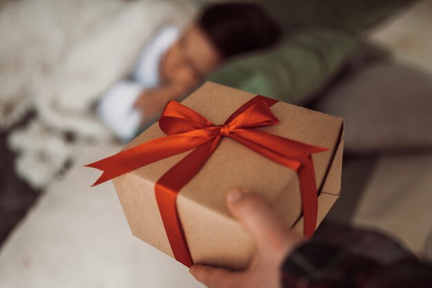 Close up on festively wrapped Christmas gift box