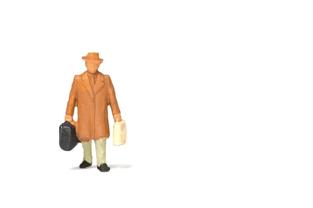 Close-up of figurine against white background