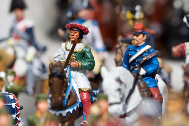 Close-up of figurines against blurred background