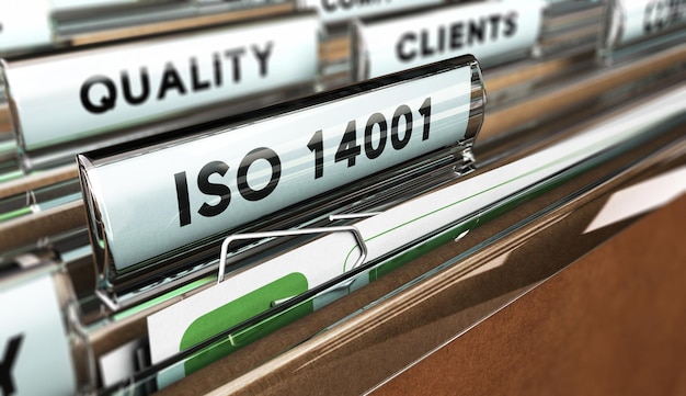 Photo close up on a file tab with the word iso 14001, focus on the main text and blur effect. concept image for illustration of quality standards