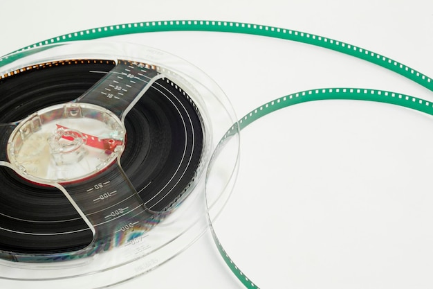 Photo close-up of film reel over white background