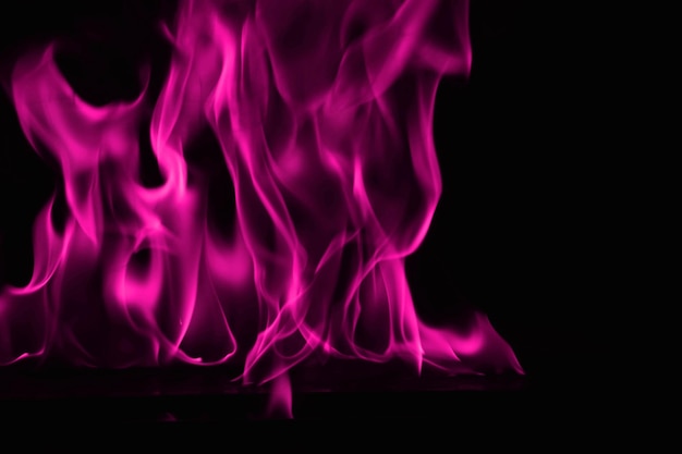 Photo close-up of fire against black background