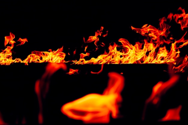 Photo close-up of fire burning at night