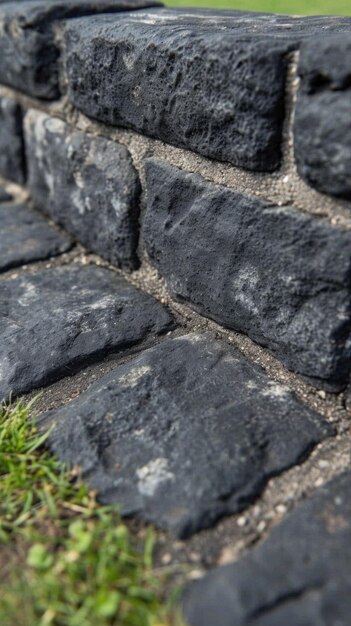 A close up of a fire hydrant sitting on top of some bricks ai