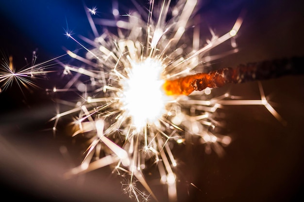 Photo close-up of firework display at night