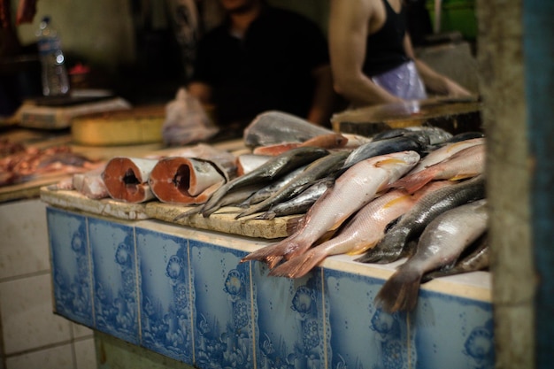 Photo close-up of fish for sale in market