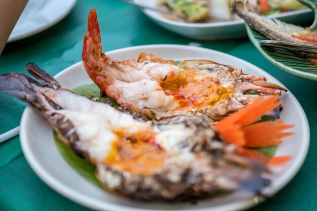 Close-up of fish served in plate on table