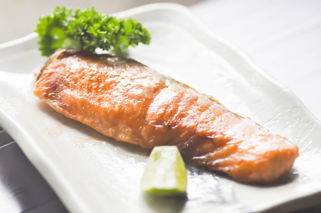 Close-up of fish served in plate on table