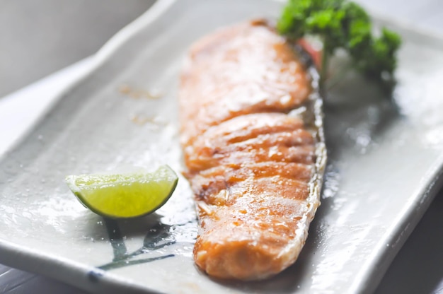 Close-up of fish served on table