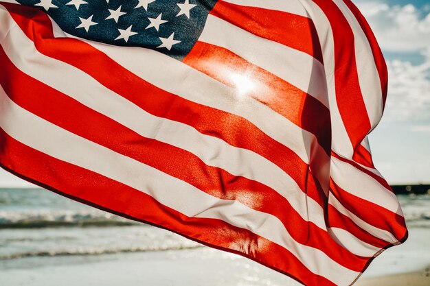 Photo close-up of flag against sky