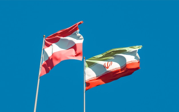 Close up on flags of Iran and Austria