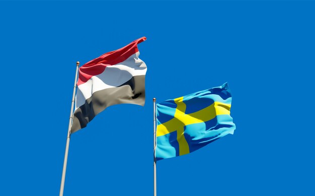 Close up on flags of yemen and sweden