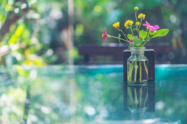 close-up of flower vase on glass table