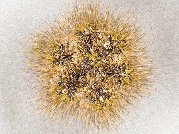 A close up of a flower with gold and silver beads