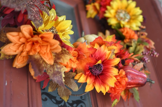 Photo close-up of flowers on autumn wreath