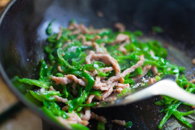 Photo close-up of food being prepared in pan