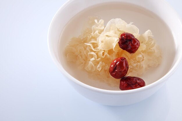 Close-up of food in bowl over white background