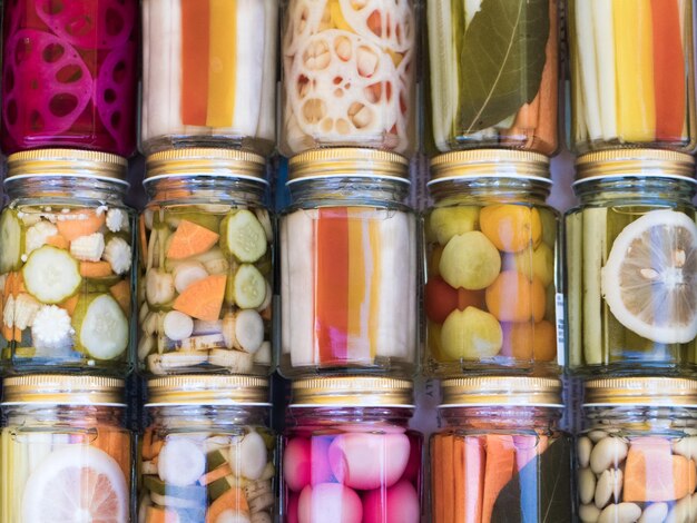 Photo close-up of food in containers for sale