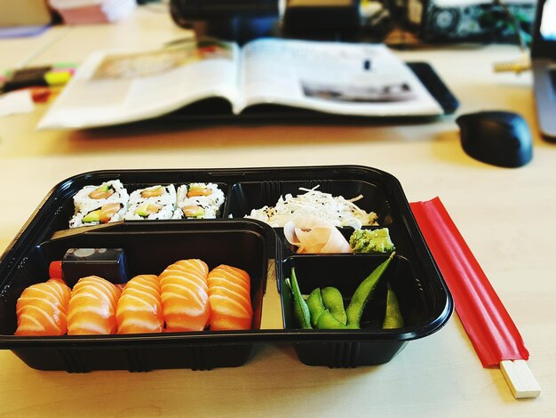 Close-up of food in lunch box on table