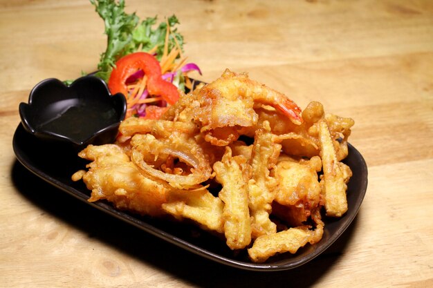 Photo close-up of food in plate on table