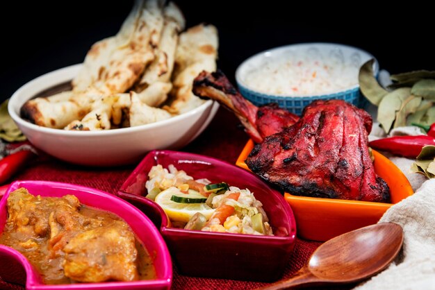 Close-up of food served on table against black background