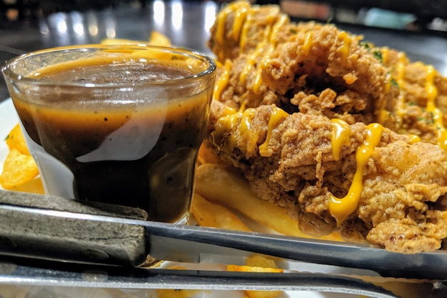 Photo close-up of food served on table