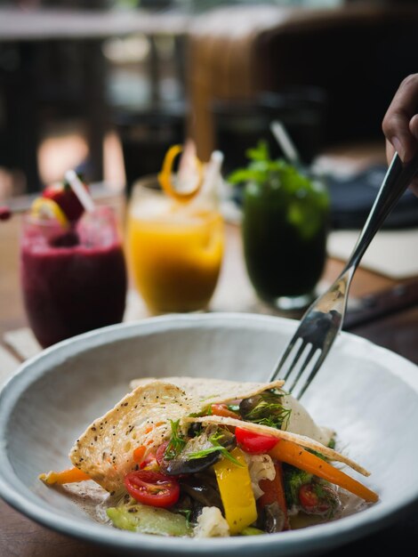 Photo close-up of food served on table