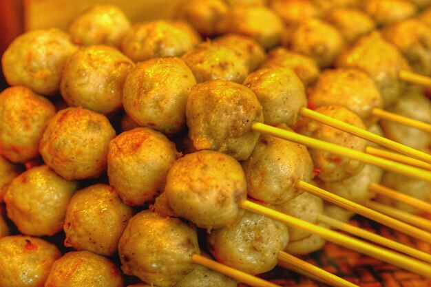 Close-up of food with skewers