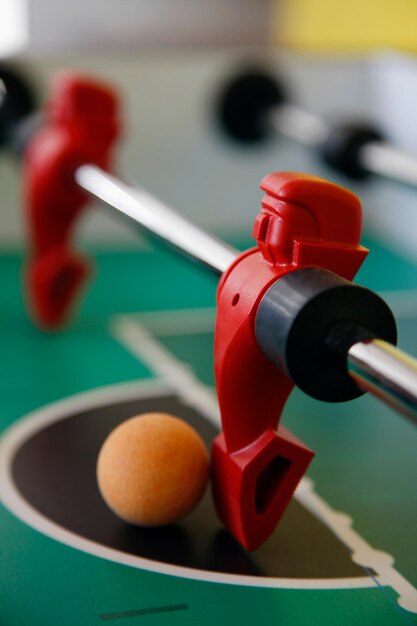 Close-up of foosball on table