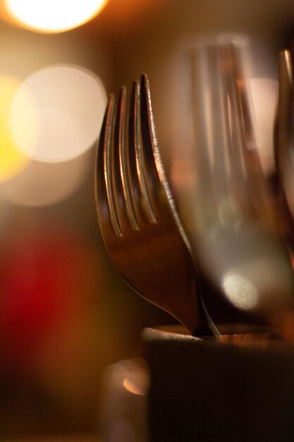 Photo close-up of fork in container