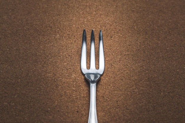 Photo close-up of fork on table