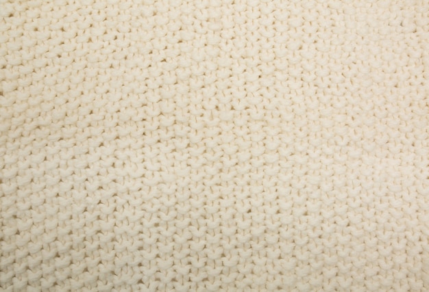 Close-up foto van beige gebreide sjaal