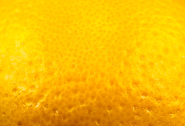 Close-up foto van sinaasappelschil. Sinaasappelen rijp fruit achtergrond, macro weergave. Detailopname.