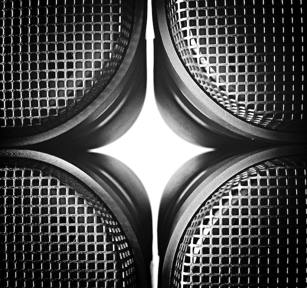 Photo close-up of four cropped loudspeakers